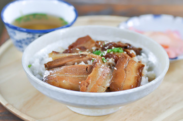 rice topped with pork or pork stew