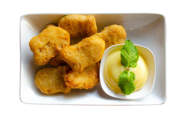 Chicken nuggets on white dish isolated  background,clipping path.