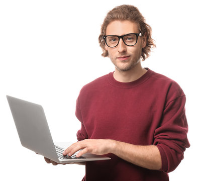 Male programmer with laptop on white background