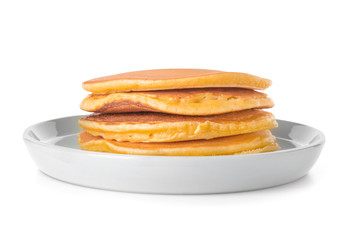 Plate with tasty pancakes on white background