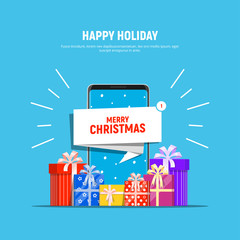 Smartphone with notification Merry Christmas and pile gifts boxes. Christmas online shopping concept.