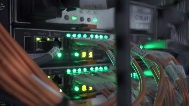 Many cables in the server rack. The video contains flicker.