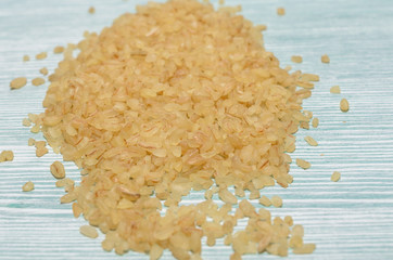 Uncooked bulgur close-up, healthy eating concept, food background