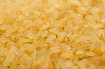 Uncooked bulgur close-up, healthy eating concept, food background