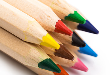 Fototapeta premium Wooden colorful ordinary pencils isolated on a white background