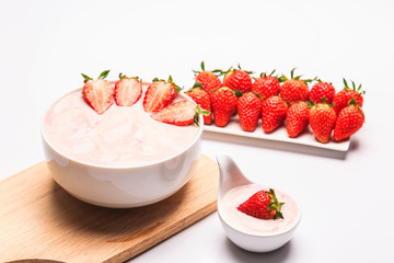 Yogurt with strawberry isolated  on white background