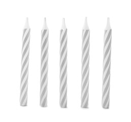 Silver striped birthday candles isolated on white