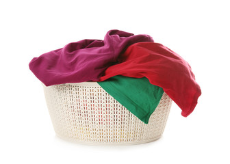 Laundry basket with dirty clothes on white background