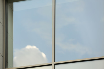 Closeup view of tinted window. Urban architecture