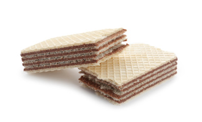 Delicious broken crispy wafer on white background. Sweet food