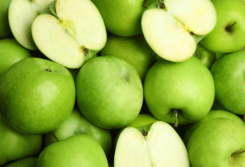Fresh ripe green apples as background, closeup view
