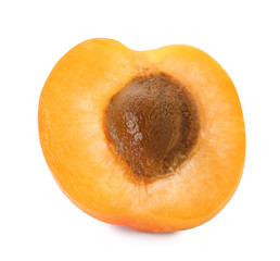 Half of delicious ripe sweet apricot with kernel on white background
