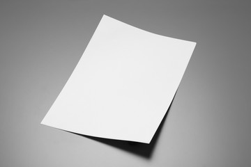 Blank paper sheets for brochure on grey background. Mock up