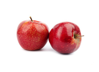 Ripe juicy red apples on white background