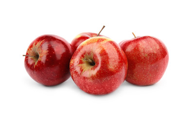 Ripe juicy red apples on white background