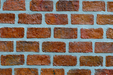 Orange brick used in construction architecture, background texture