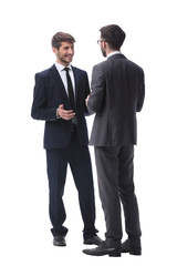 in full growth. two young businessmen discussing something
