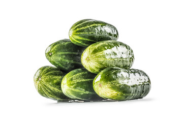Fresh cucumbers isolated on white background - close-up