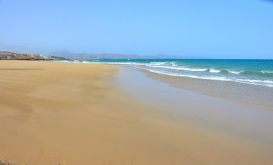 Fototapeta na wymiar Large Fine Sand Beach of Sotavento with Low Tide in Fuerteventura