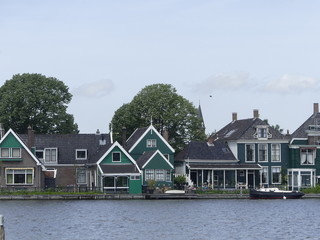  Windmills by the water. Authentic town. The old town in Holland.