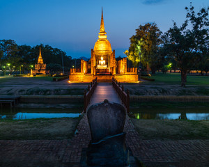 Fototapeta na wymiar Wat Mahathat Temple at the Historical Park in Sukhothai in Thailand.