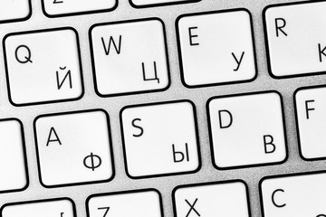 White aluminum keyboard buttons wasd close-up, game keys