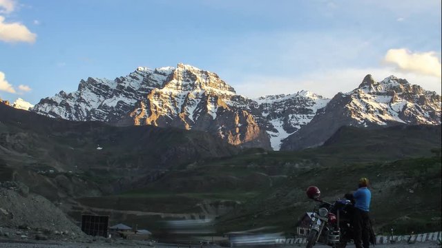 vTime Lapse of sunset over Himalayan mountains of Jammu and Kashmir's Kargil region.