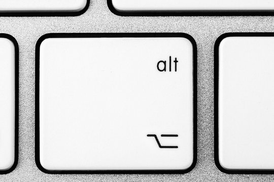 White aluminum keyboard alt button close-up