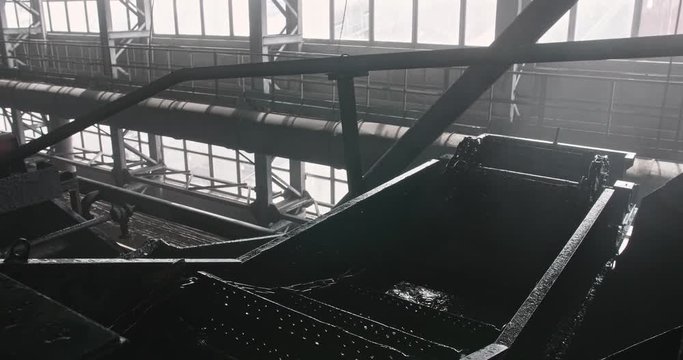 The work of the coal factory. Enrichment at the manufacture. Movement of ore Mechanical screening. Washing Plant. Wet coal goes down conveyor at factory. Work of mechanisms