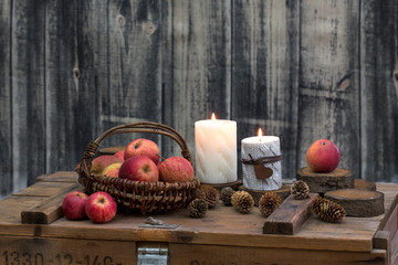 Fototapeta na wymiar Hygge Still Life With Candles And Apples