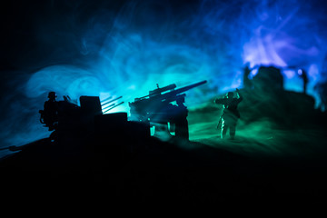 War Concept. Military silhouettes fighting scene on war fog sky background,