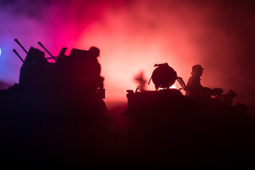 War Concept. Military silhouettes fighting scene on war fog sky background,
