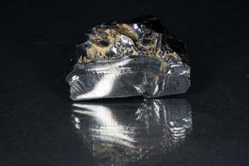 Shungit is a black rock that consists mainly of carbon and was photographed in top quality and...