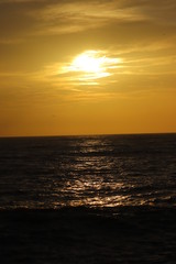 Fototapeta premium Sun set on a sea with orange sky