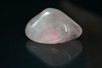 Quartz also called deep quartz photographed in studio in front of black background in Marco mode 