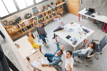 Group of Asian business people and creative designer meeting in office, teamwork and success...