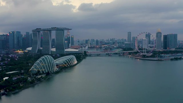 Drone Aerial view 4k Footage of the Marina Bay Sands in Singapore City Skyline. 