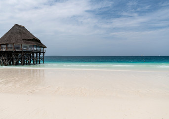 wooden building on the beach