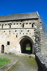 Fototapeta na wymiar Wales, Denbighshire. A former Cistercian monastery founded in 1201. The arched entrance to the former cloisters.