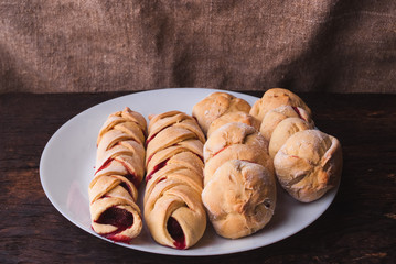Homemade Organic Berry Pie with blueberries and blackberries on wooden background