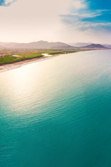 Graniro beach with Santa Lucia old town on the Sardinia Island, Italy