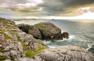 lush west coast of isle of Lewis, outer Hebrides in Scotland with dramatic cloudy sky