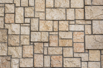 Elegant stone wall from small square parts