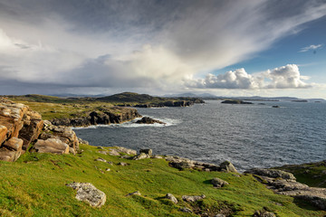 lush west coast of isle of Lewis, outer Hebrides in Scotland with dramatic cloudy sky