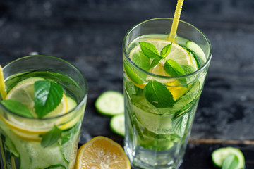 Summer detox water with lemon, mint, cucumber and Basil. Summer chilled lemonade