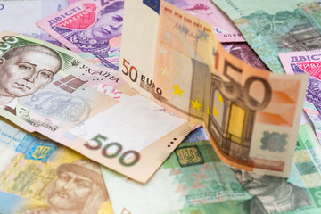 various ukrainian hryvna and 50 euro banknote trade exchange concept
