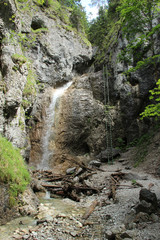 Dangerous trail through a waterfall with steel ladders in the Slovak Paradise National Park, Slovaki