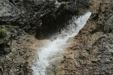 A wet trail running through streams in the Slovak Paradise National Park