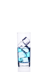 .Glass beaker is filled with a blue cocktail ice cubes on a white background.