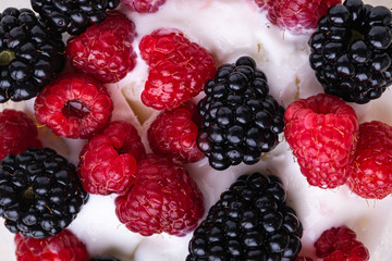 Ice cream with raspberry and blackberry berries, milk, frosty, texture, top view